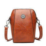 Freya – compact monochrome mini handbag — view 1