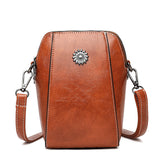 Freya – compact monochrome mini handbag — view 1
