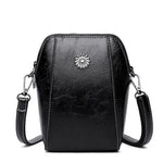 Freya – compact monochrome mini handbag — view 2