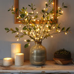 Olive branch with decorative lights — view 2